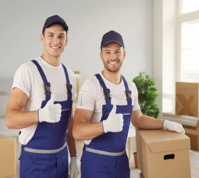 two people preparing packages
